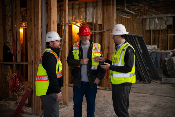 Construction workers building a hotel